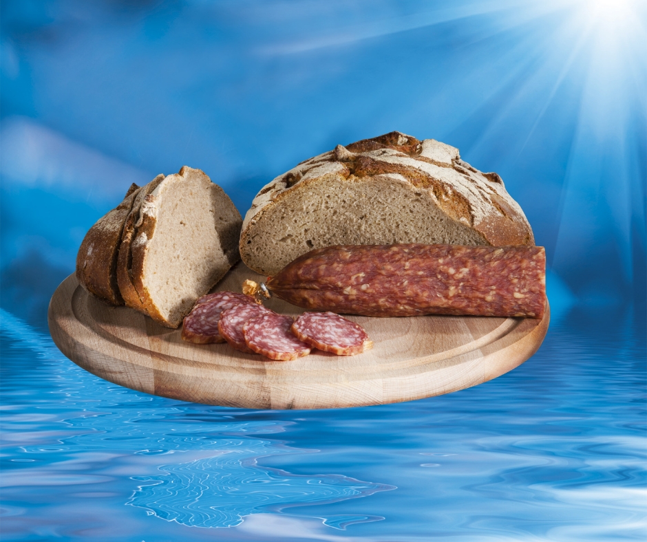 Abbildung der Sole Ahle-Wurscht auf einem Brettchen.